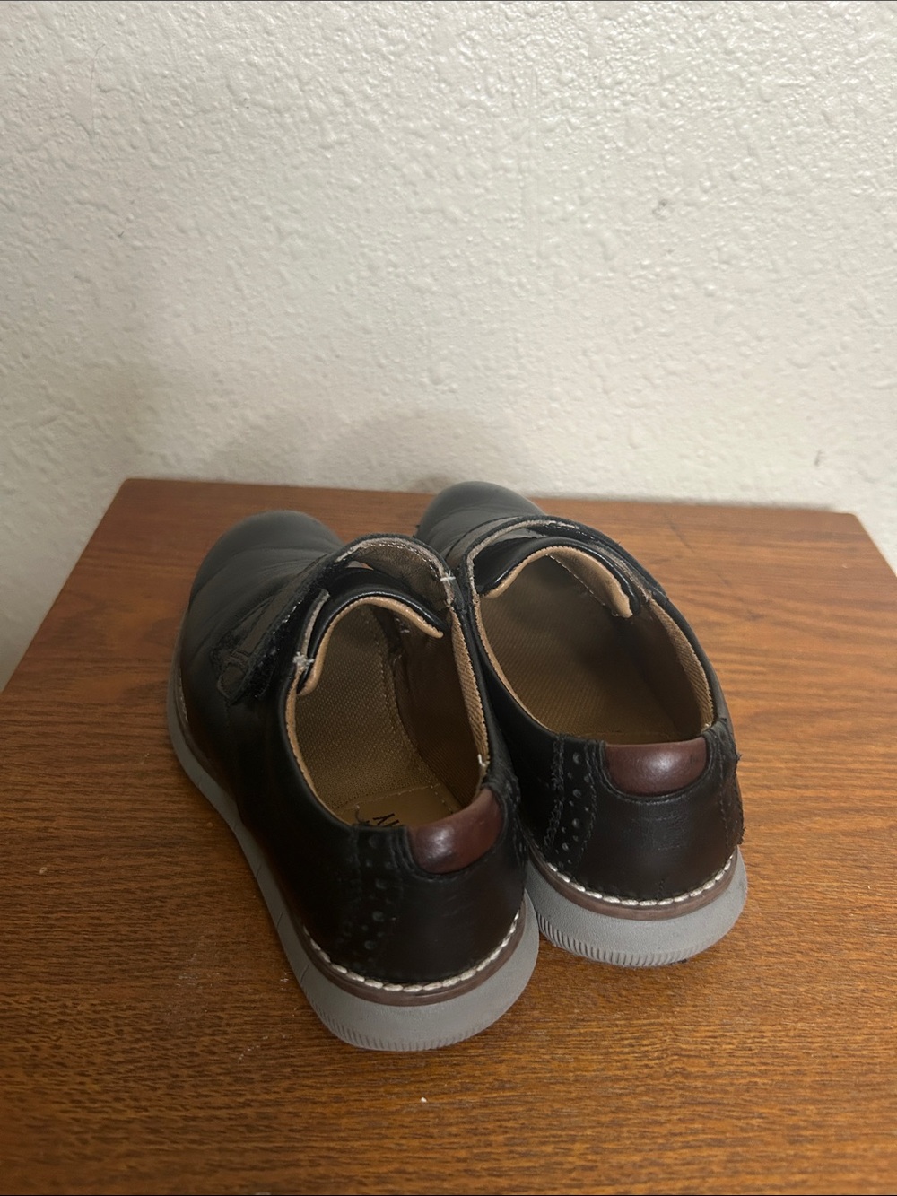 Johnston & Murphy Black Kids Slip-On Dress Shoes with Brown Heel Tab